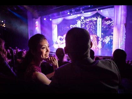 Couple enjoying a Las Vegas show. 