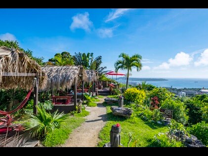 Beach side cabanas at The Beach Resort Sesoko by Hilton Club, Okinawa, Japan. 