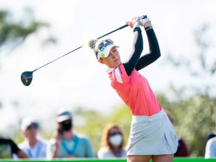 LPGA athlete taking a swing at the Hilton Grand Vacations Tournament of Champions, Orlando, Florida. 