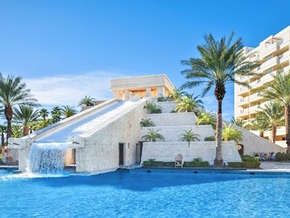 The pool at Cancun Las Vegas, a Hilton Vacation Club, with a Mayan pyramid and waterfall