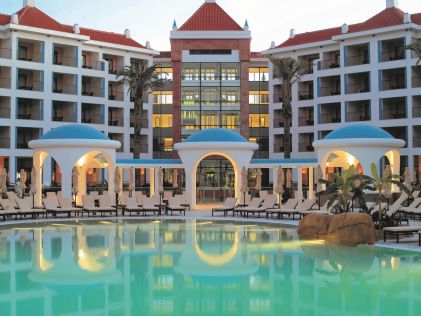 The resort exterior and pool at Vilamoura, a Hilton Grand Vacations Club, in Portugal