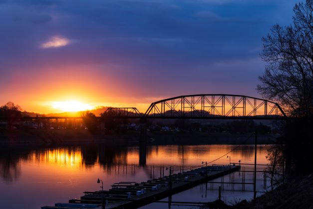 Blazing sunrise coming through train trellis, Charleston, South Carolina. 