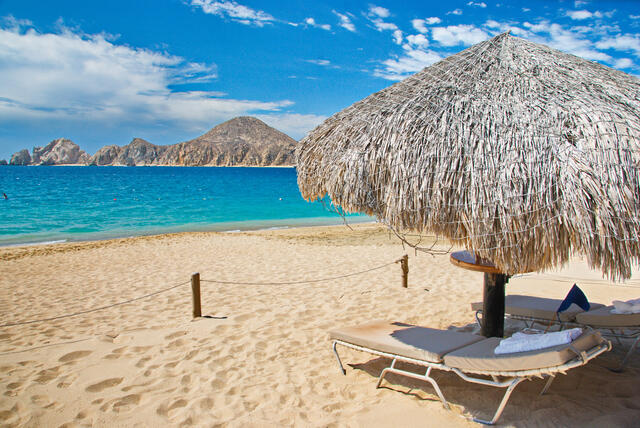 Beautiful beach, mountains in distance, turquoise waters, Mexico. 