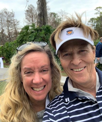 Hilton Grand Vacations Owner Laurie takes a selfie with actor Jack Wagner at the 2023 Hilton Grand Vacations Tournament of Champions