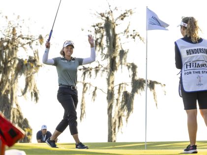 LPGA player Brooke Henderson celebrating at the Hilton Grand Vacations Tournament of Champions